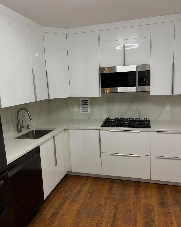 Restored kitchen with white cabinets after water damage in Cudahy